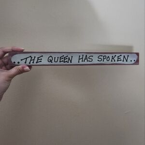 The queen has spoken sign